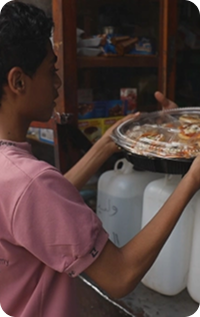 Boy serving food